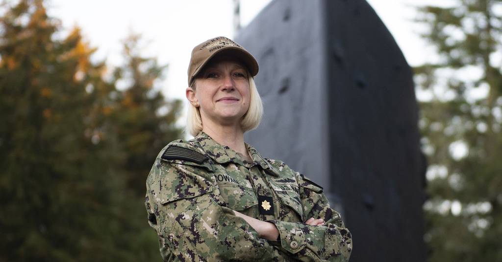 Lt. Cmdr. Amber Cowan, the executive officer of the gold crew of the Ohio-class ballistic-missile submarine Kentucky, from Colorado Springs, Colorado, poses for a portrait at Deterrent Park onboard Naval Base Kitsap – Bangor, November 18, 2022. (Mass Communication Specialist Brian G. Reynolds/U.S. Navy)